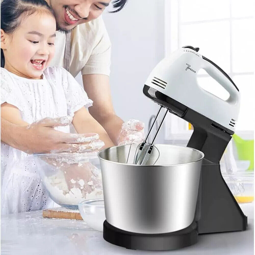 Person and child using a hand mixer in a kitchen setting