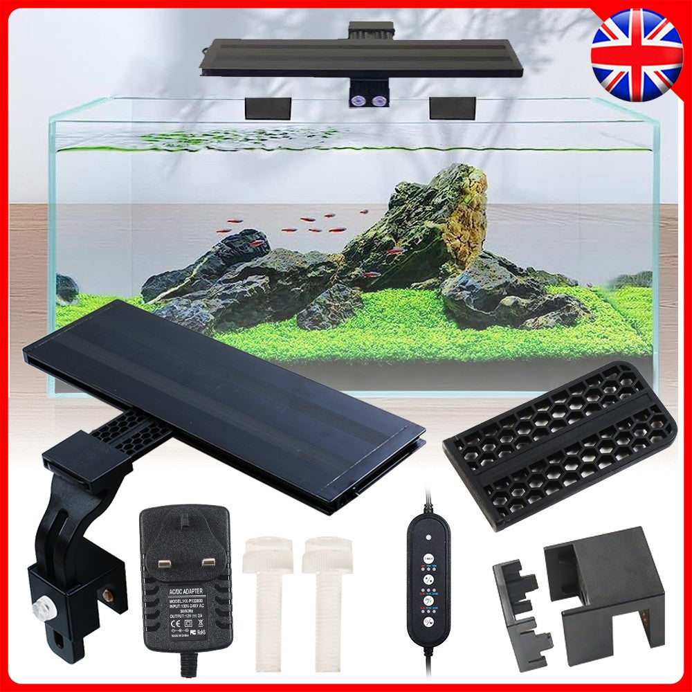 Aquarium lighting kit with components displayed in front of an aquarium setup.
