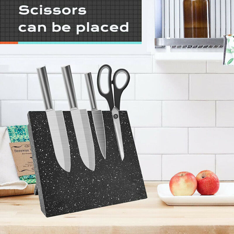 Knife block with knives and scissors on a kitchen counter