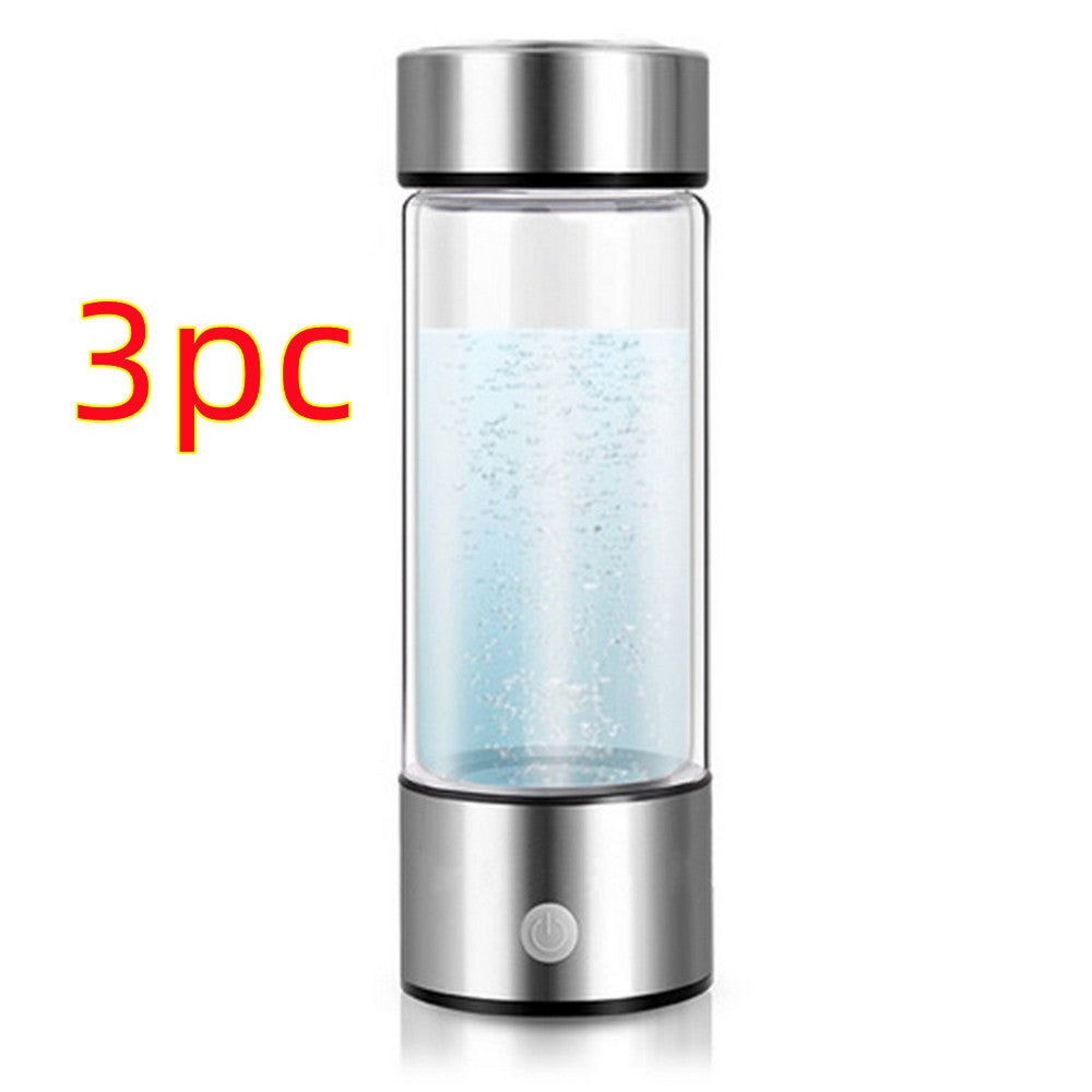 Glass water bottle with silver lid and base on a white background, labeled '3pc'.