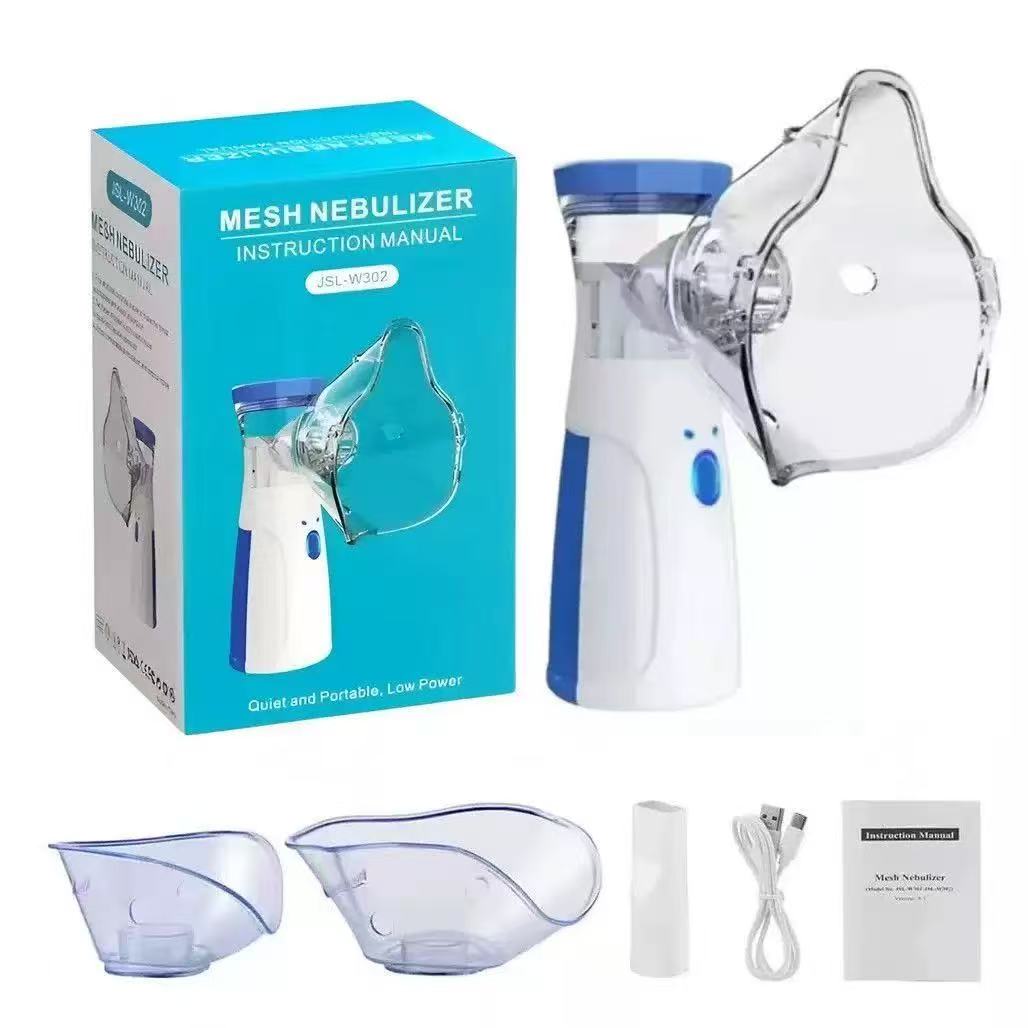 Mesh nebulizer with packaging, attachments, and user manual on a white background