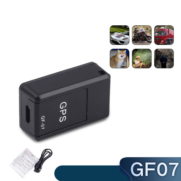 Black GPS tracker with power cable on a white background
